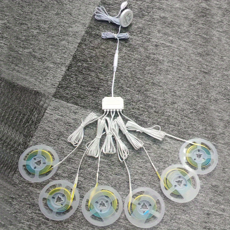 8mm 5V COB LED灯带，长度可选39.37英寸、78.74英寸或3米，配备USB接口、可调光触摸传感器和暖白光。这款无点可裁剪灯带非常适合用于厨房橱柜、衣柜、鞋架和卧室装饰