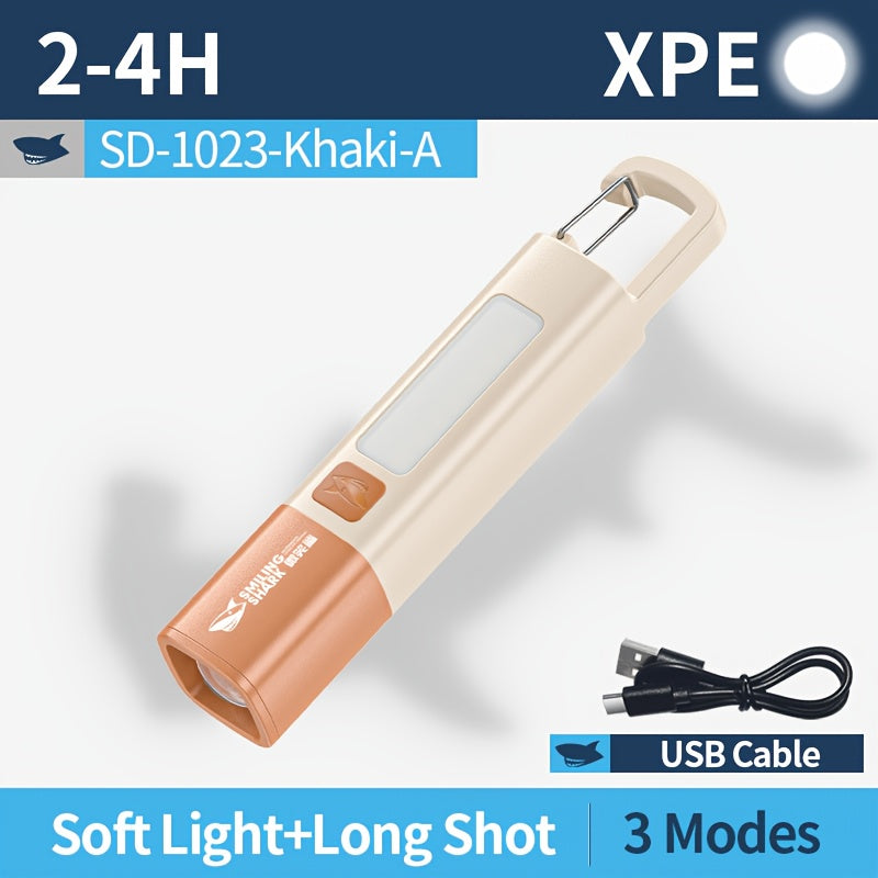 1 Unit of The SMILINGSHARK SD1023 Portable LED Flashlight, Featuring a Super Bright Handheld Zoomable Design, USB Rechargeable Capability, Colorful Appearance, a Hook Lock Feature, And Functions As a Power Bank