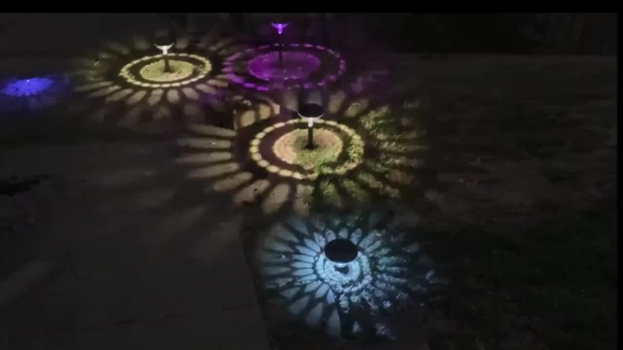 A Set of 8 Solar Path Lights with Color Changing Function and 8 Fixed Colors (Warm White, Cool White, RGB). These Outdoor Solar Garden Lights are Perfect for Decorating Walkways, Courtyards and Backyard Landscapes.