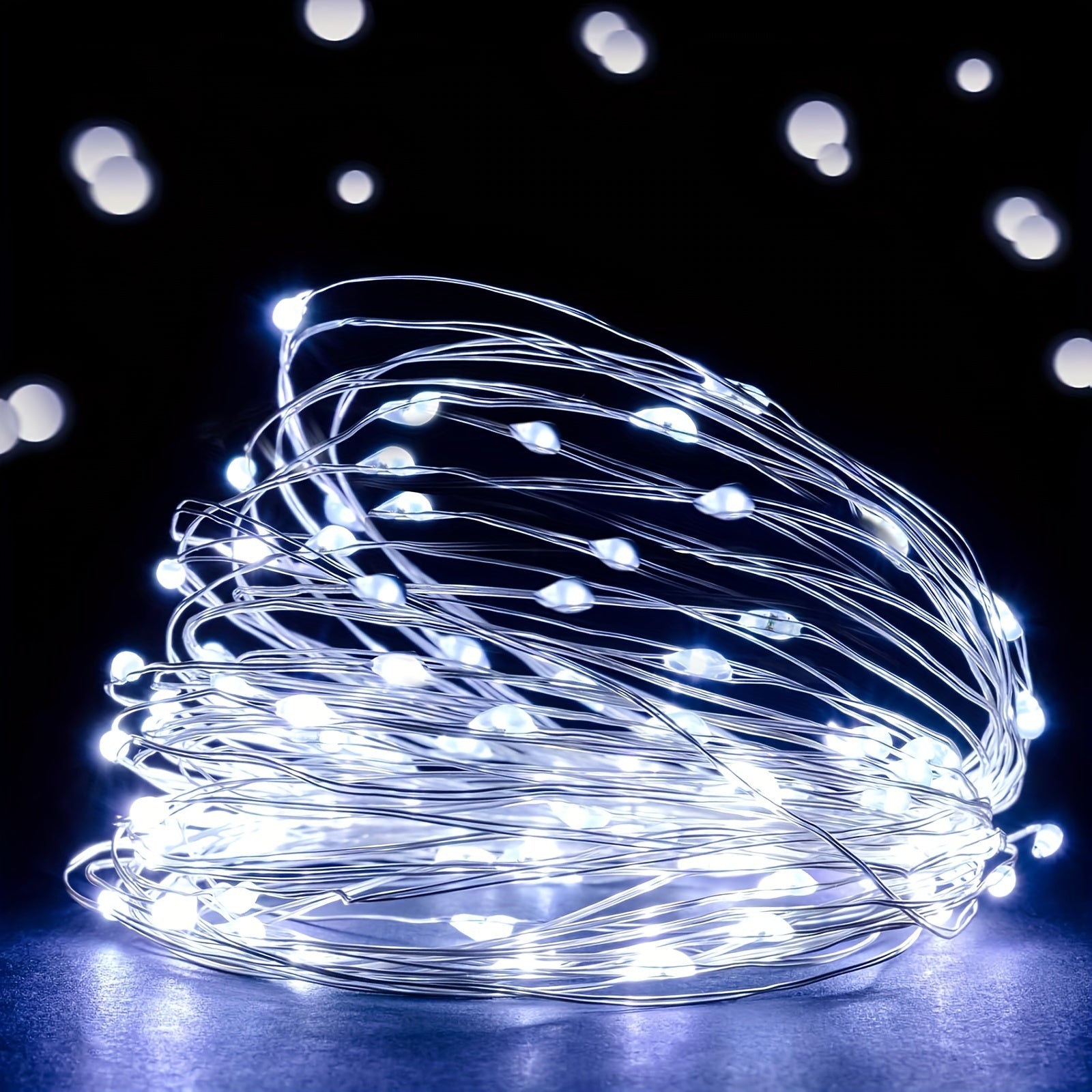 200 LED 仙女灯串，66FT/20M，100 LED 版本为 33FT/10M，USB 供电灯串，银色线材，非常适合在卧室中营造星空氛围，用于圣诞节、婚礼、派对或户外窗户装饰