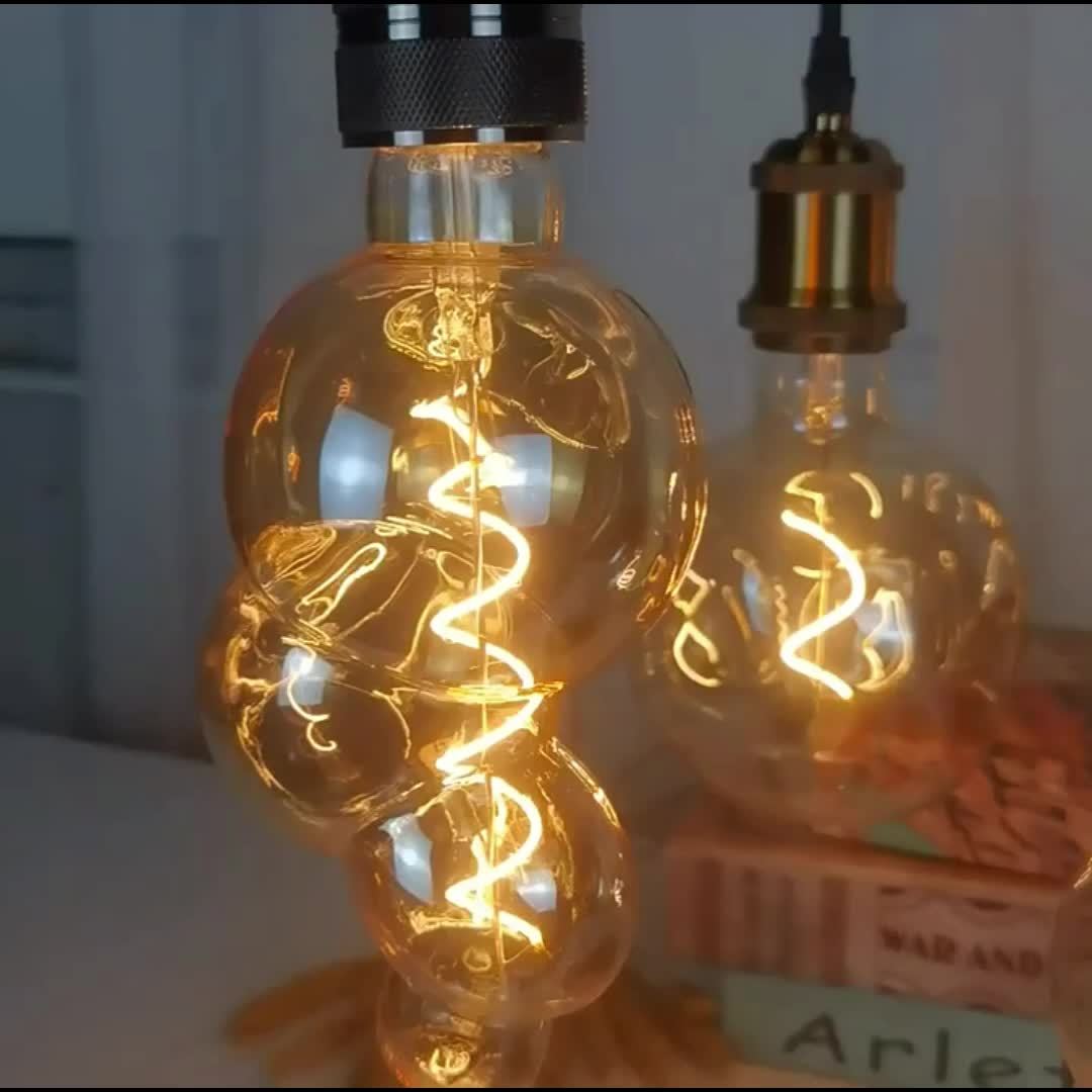 1PC vintage Edison LED flexible filament bulb, creative LED dimmable bulb 110-130V 4W E26 base 2300K warm light amber glass bulb, bedroom living room home decorative bulb