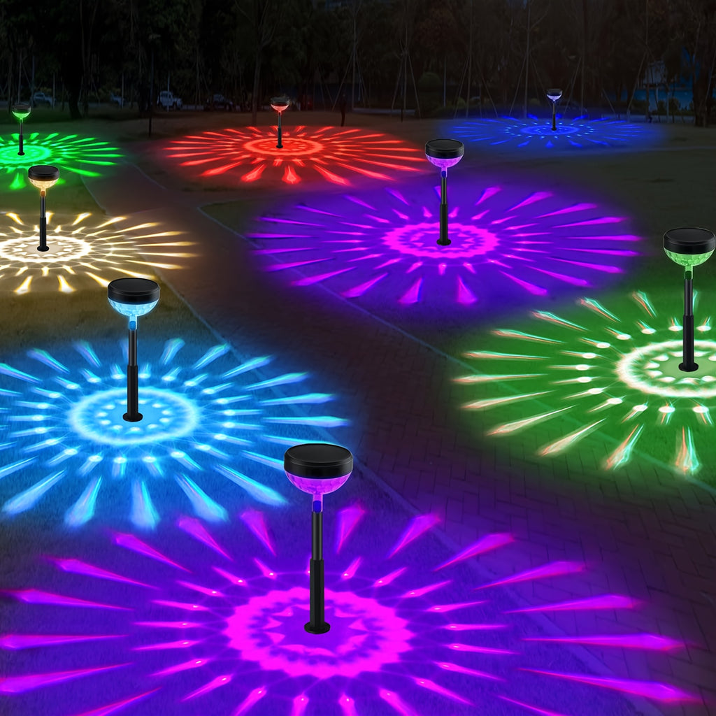 A Set of 8 Solar Path Lights with Color Changing Function and 8 Fixed Colors (Warm White, Cool White, RGB). These Outdoor Solar Garden Lights are Perfect for Decorating Walkways, Courtyards and Backyard Landscapes.